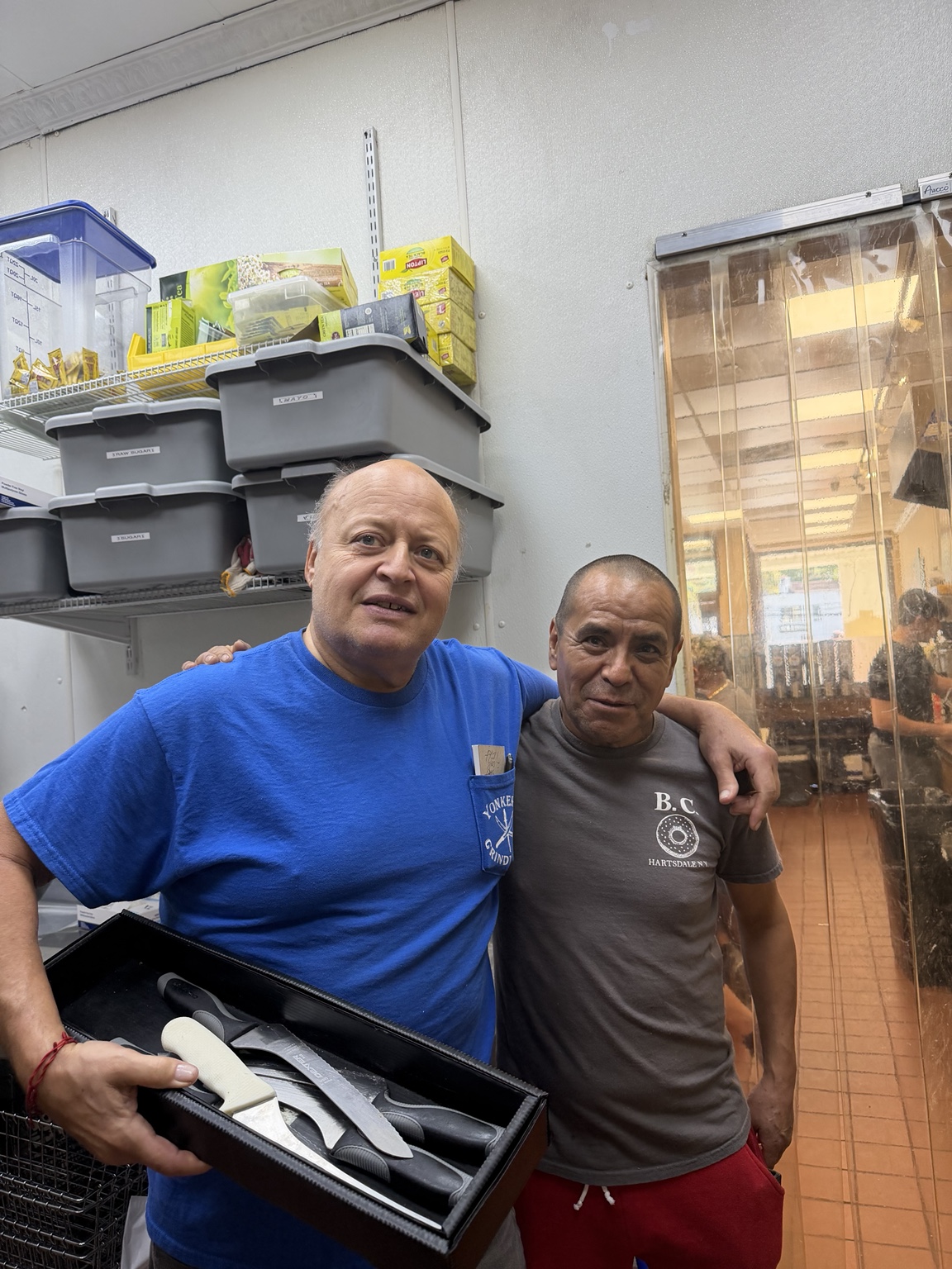 Bagel Central’s two bakers together in the shop’s kitchen